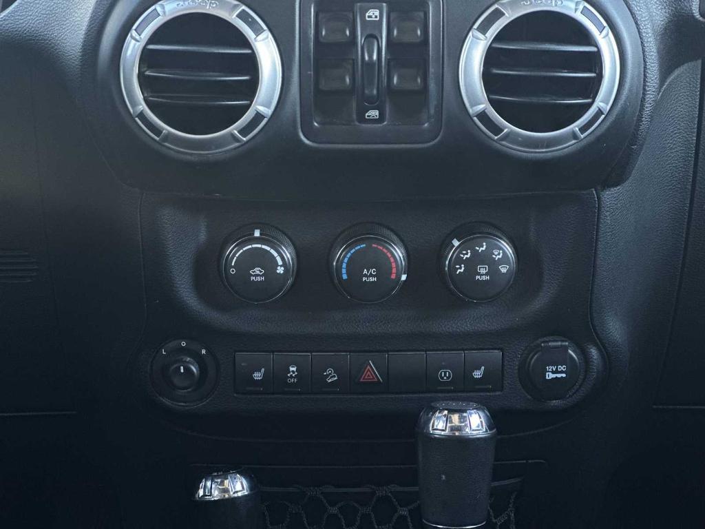 used 2015 Jeep Wrangler Unlimited car, priced at $16,004