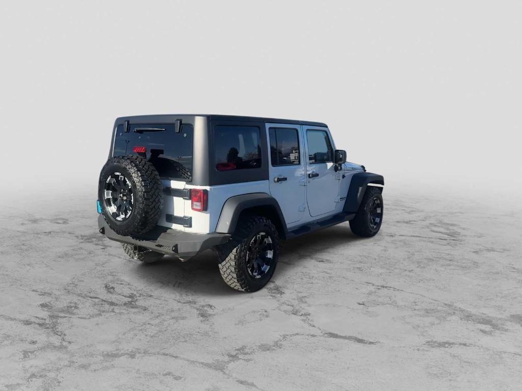 used 2015 Jeep Wrangler Unlimited car, priced at $16,004