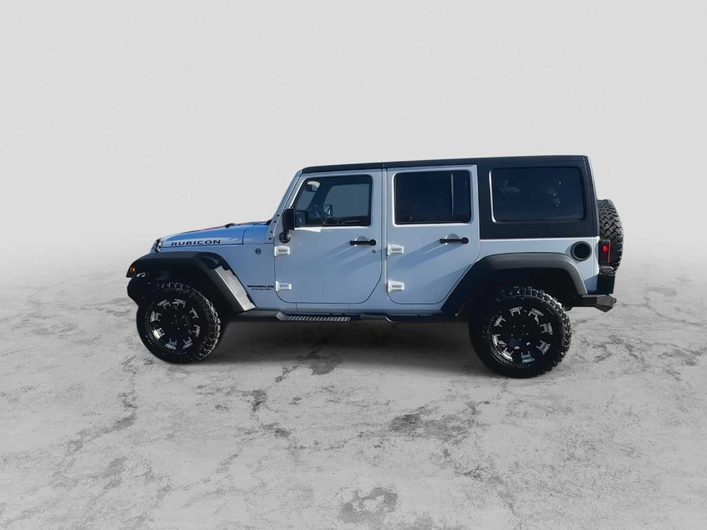 used 2015 Jeep Wrangler Unlimited car, priced at $16,004