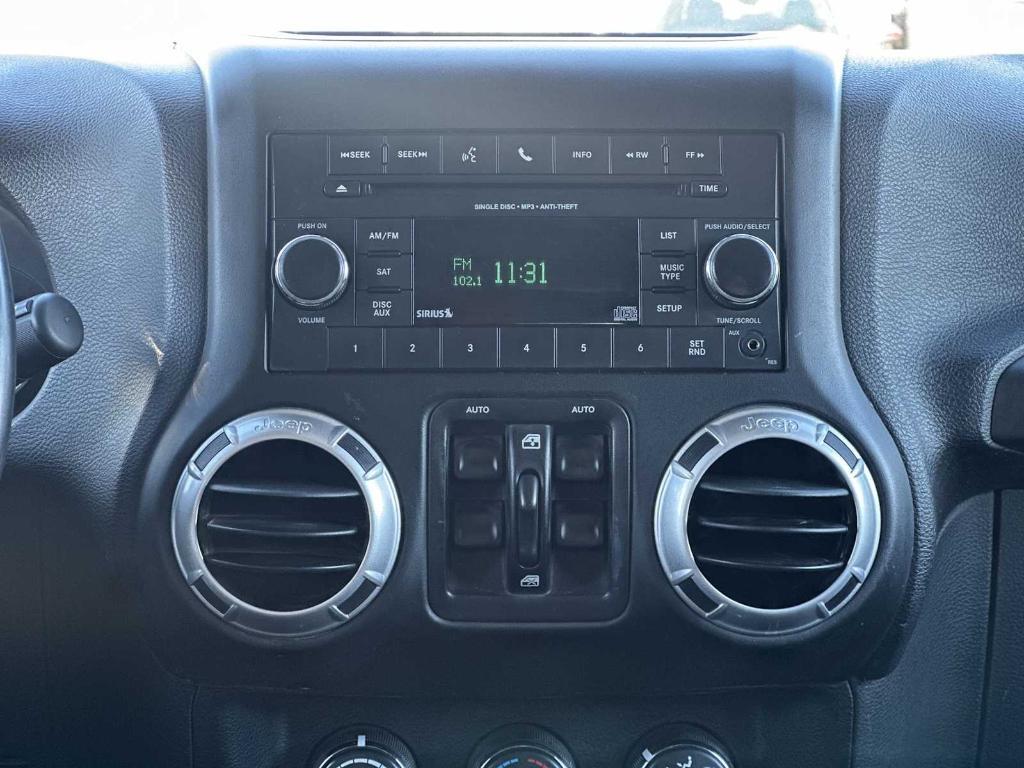 used 2015 Jeep Wrangler Unlimited car, priced at $16,004