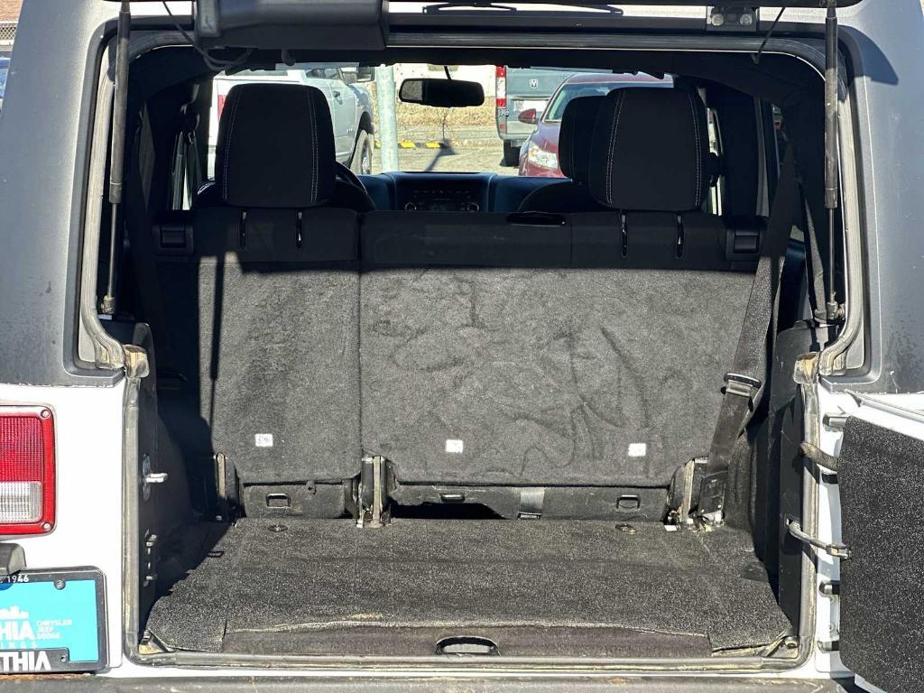 used 2015 Jeep Wrangler Unlimited car, priced at $16,004