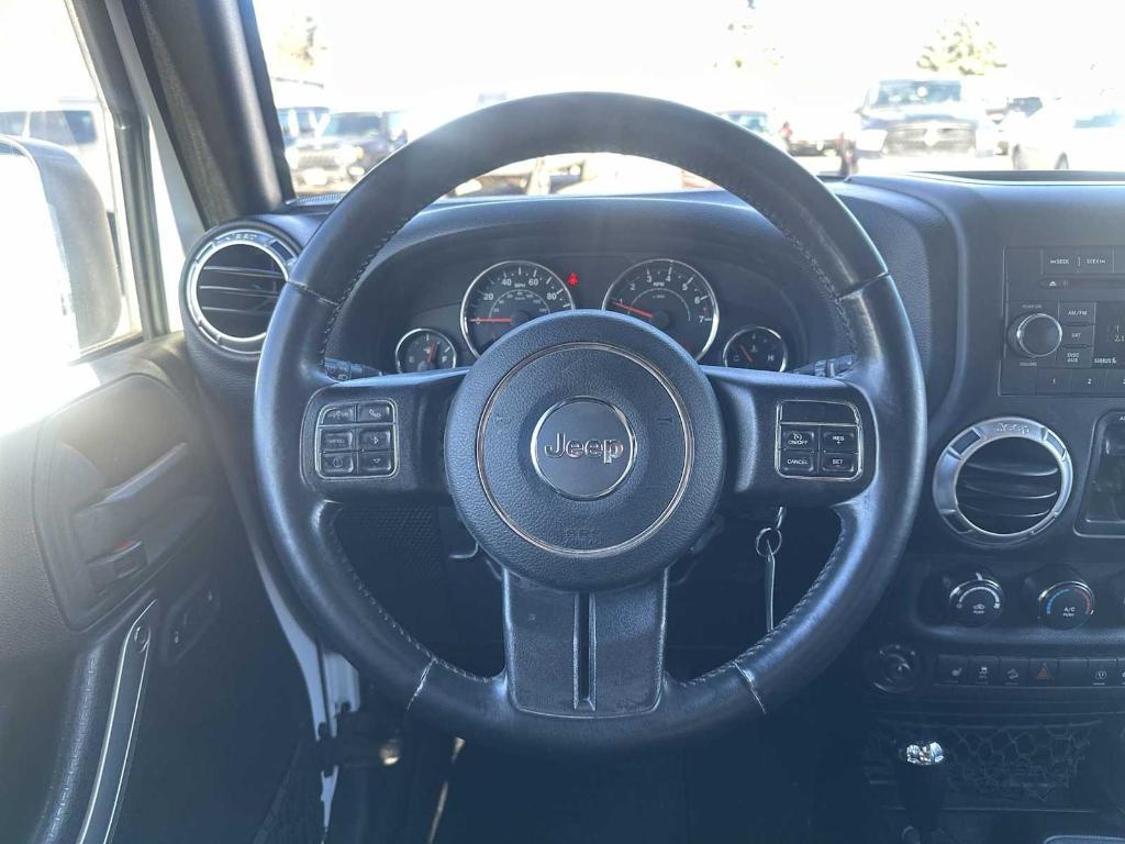 used 2015 Jeep Wrangler Unlimited car, priced at $16,004