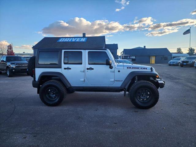 used 2012 Jeep Wrangler Unlimited car, priced at $18,649