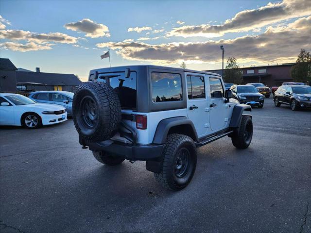 used 2012 Jeep Wrangler Unlimited car, priced at $18,649