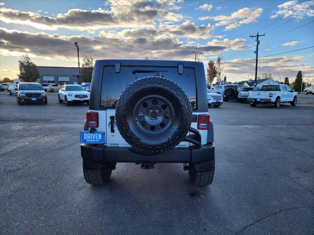 used 2012 Jeep Wrangler Unlimited car, priced at $18,649