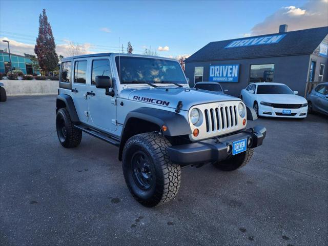 used 2012 Jeep Wrangler Unlimited car, priced at $18,649