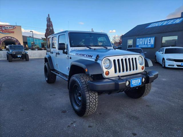 used 2012 Jeep Wrangler Unlimited car, priced at $18,649