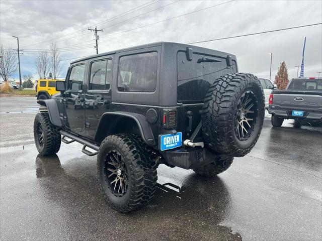 used 2014 Jeep Wrangler Unlimited car, priced at $19,950