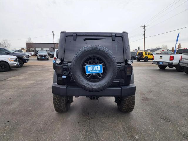 used 2014 Jeep Wrangler Unlimited car, priced at $19,958