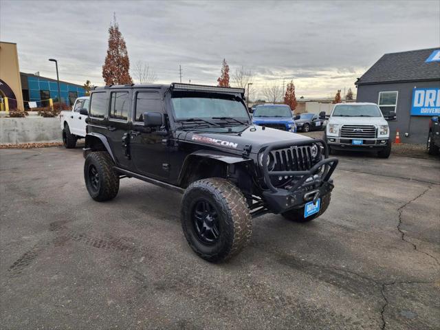 used 2014 Jeep Wrangler Unlimited car, priced at $19,958