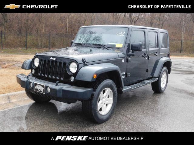 used 2014 Jeep Wrangler Unlimited car, priced at $16,909