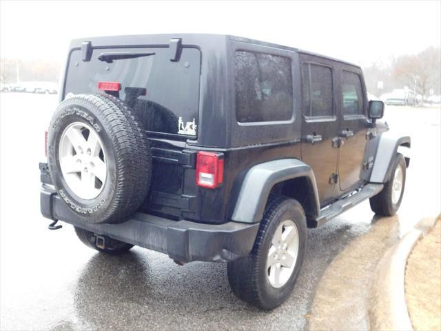 used 2014 Jeep Wrangler Unlimited car, priced at $16,909