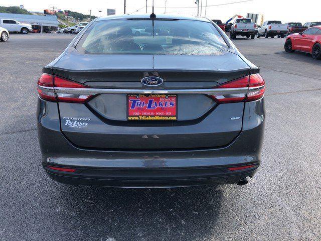 used 2018 Ford Fusion car, priced at $12,140