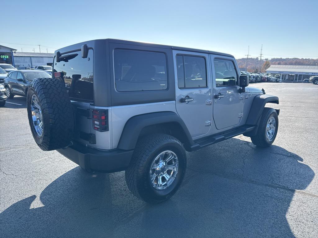 used 2018 Jeep Wrangler JK Unlimited car, priced at $19,541