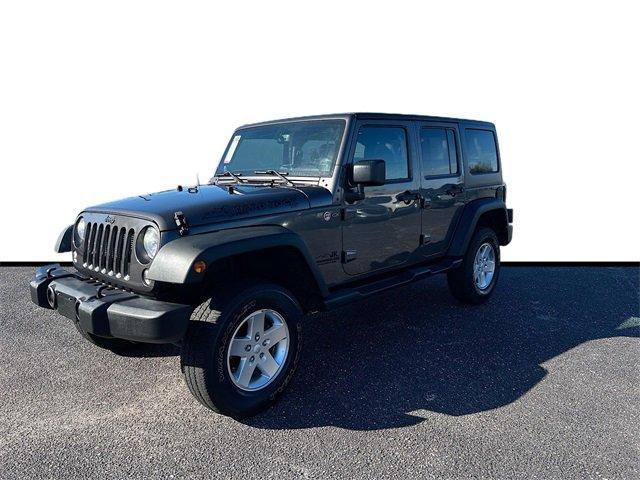 used 2014 Jeep Wrangler Unlimited car, priced at $17,825