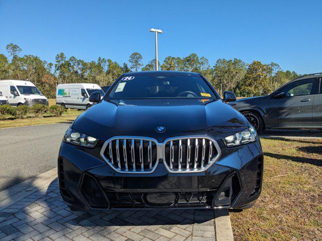 used 2024 BMW X6 car, priced at $65,378