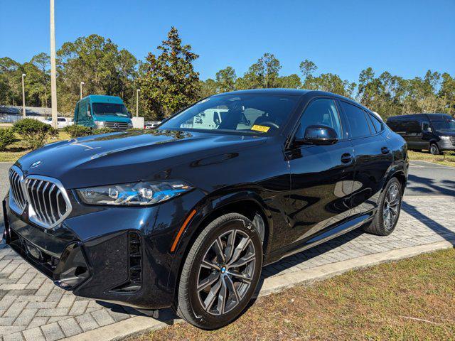 used 2024 BMW X6 car, priced at $65,378