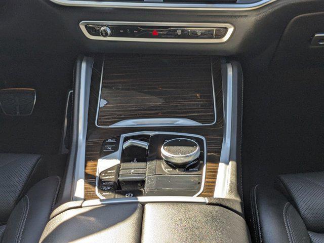 used 2024 BMW X6 car, priced at $65,378