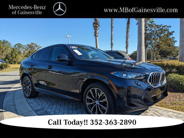 used 2024 BMW X6 car, priced at $65,378