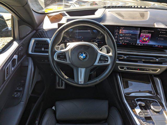 used 2024 BMW X6 car, priced at $65,378