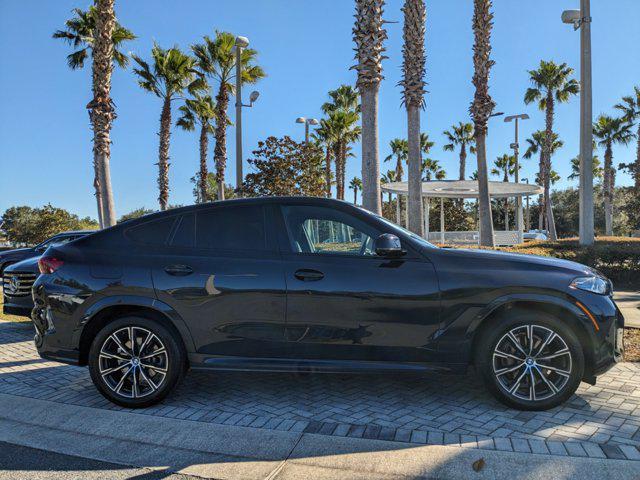 used 2024 BMW X6 car, priced at $65,378