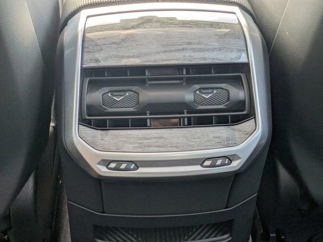 used 2024 BMW 740 car, priced at $73,926