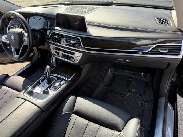 used 2016 BMW 750 car, priced at $19,777