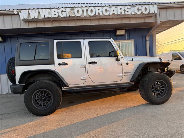 used 2011 Jeep Wrangler Unlimited car, priced at $13,998