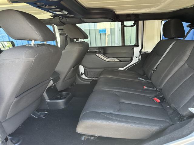 used 2015 Jeep Wrangler Unlimited car, priced at $14,898