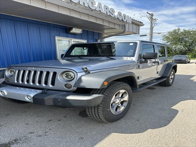 used 2015 Jeep Wrangler Unlimited car, priced at $14,898