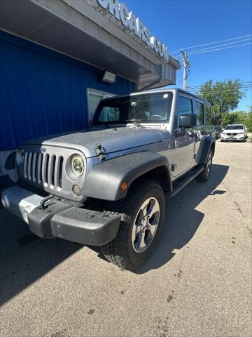 used 2015 Jeep Wrangler Unlimited car, priced at $16,998