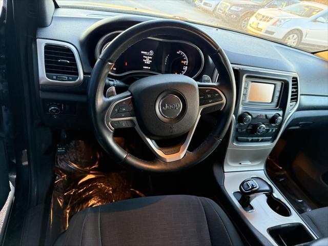 used 2014 Jeep Grand Cherokee car, priced at $9,998