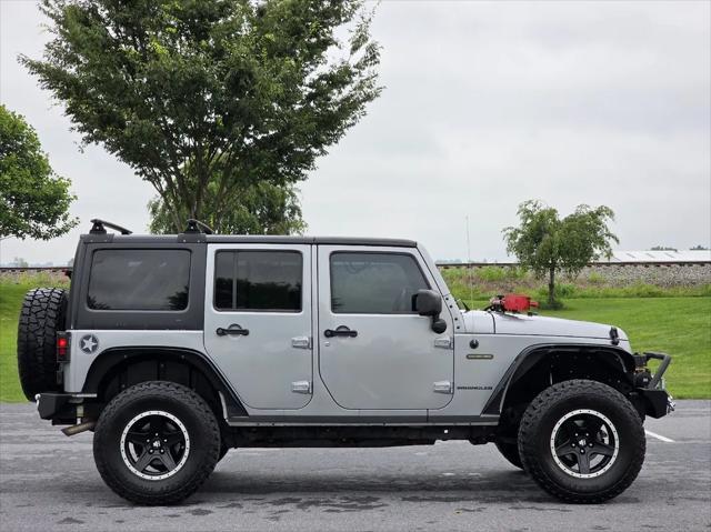 used 2016 Jeep Wrangler Unlimited car, priced at $18,987