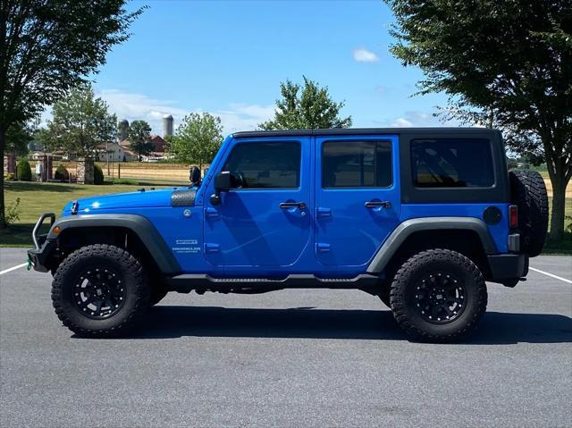 used 2011 Jeep Wrangler Unlimited car, priced at $14,987