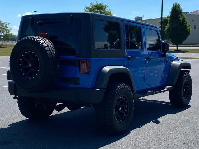 used 2011 Jeep Wrangler Unlimited car, priced at $14,987