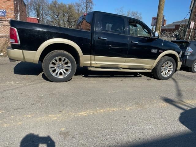 used 2014 Ram 1500 car, priced at $8,995