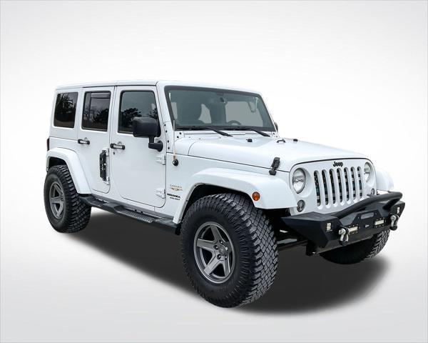 used 2014 Jeep Wrangler Unlimited car, priced at $20,306