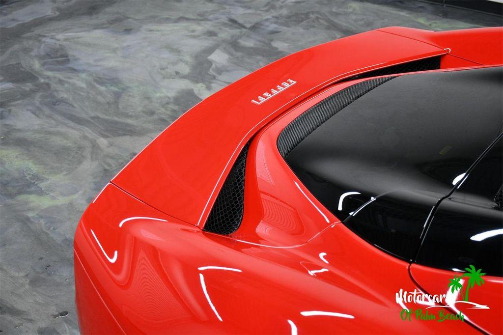 used 2024 Ferrari 296 GTS car, priced at $412,479