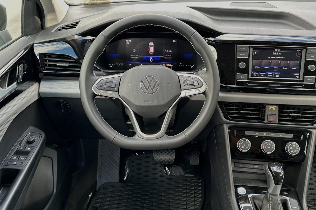 new 2024 Volkswagen Taos car, priced at $23,216