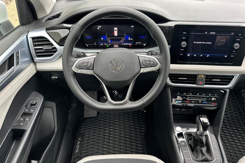 new 2025 Volkswagen Taos car, priced at $28,699