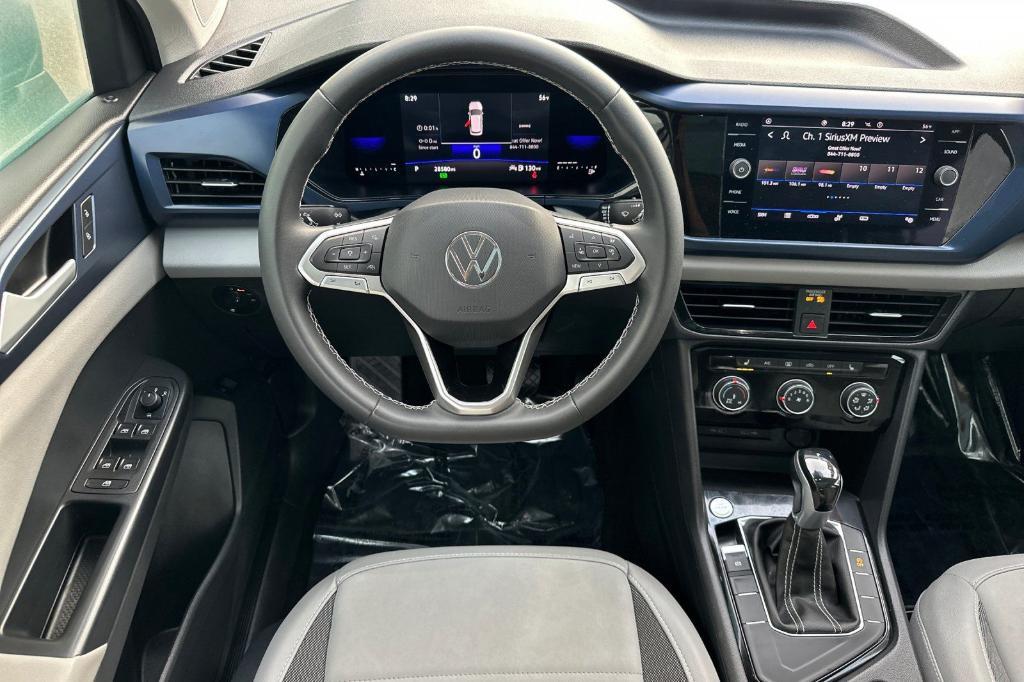 used 2023 Volkswagen Taos car, priced at $20,787