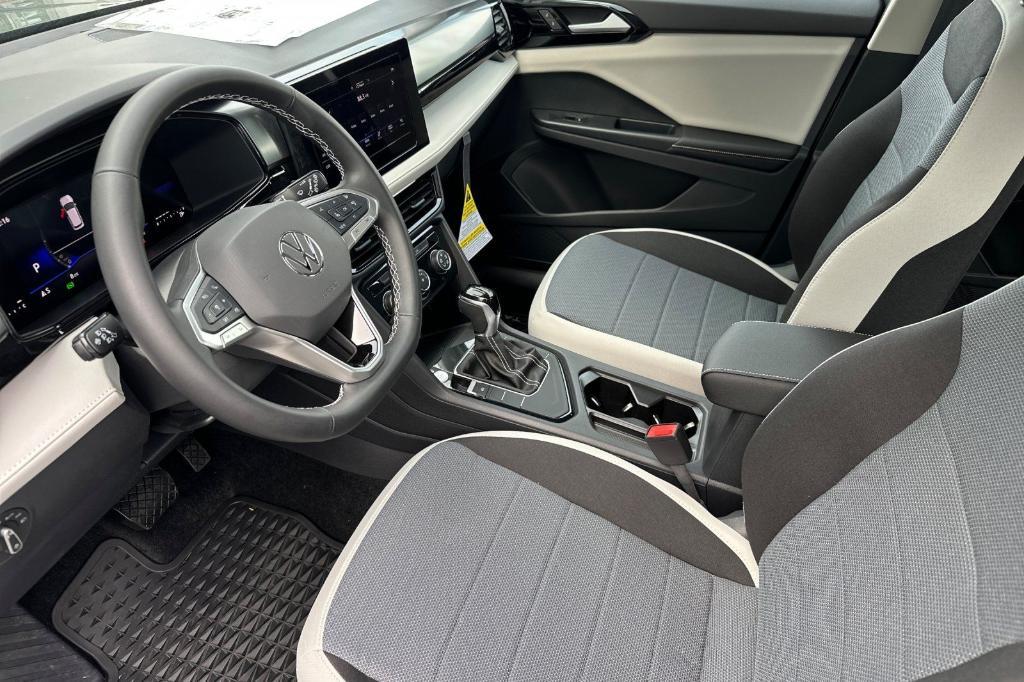 new 2025 Volkswagen Taos car, priced at $26,716