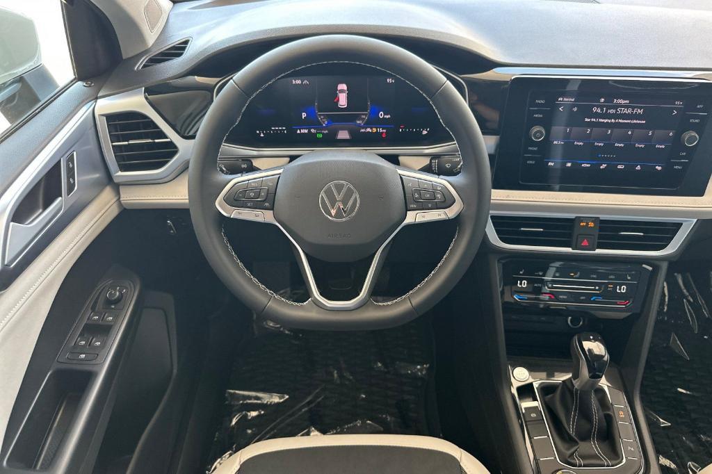 new 2025 Volkswagen Taos car, priced at $30,092