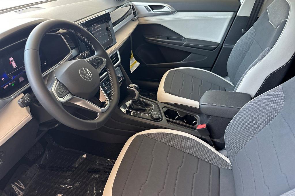 new 2025 Volkswagen Taos car, priced at $30,092