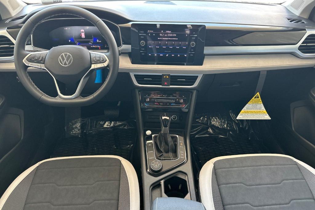 new 2025 Volkswagen Taos car, priced at $30,092