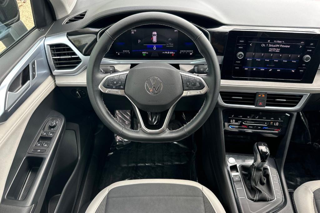 used 2025 Volkswagen Taos car, priced at $26,615