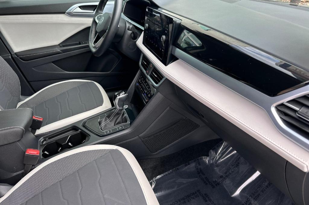 used 2025 Volkswagen Taos car, priced at $26,615