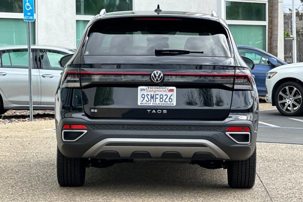 used 2025 Volkswagen Taos car, priced at $26,615