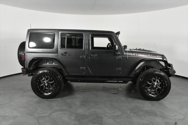 used 2016 Jeep Wrangler Unlimited car, priced at $26,969