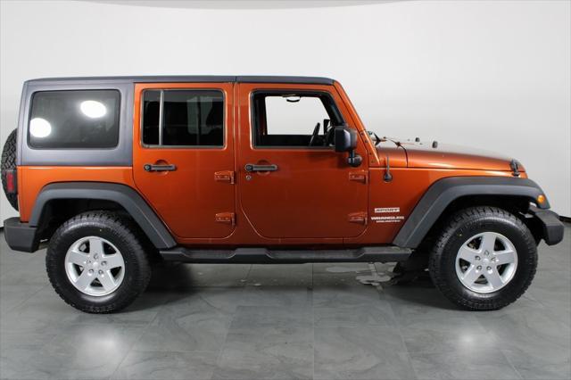 used 2014 Jeep Wrangler Unlimited car, priced at $13,987